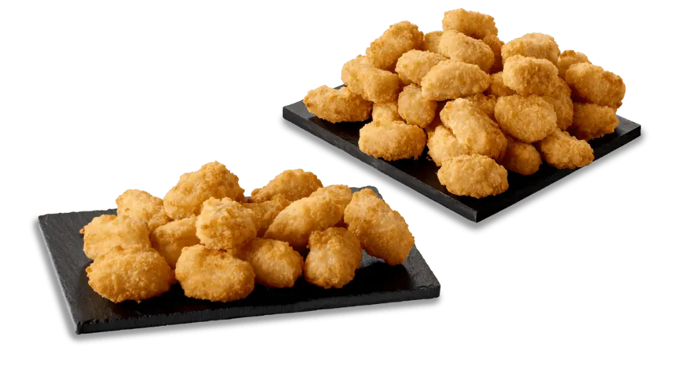 Chicken shots on black plates