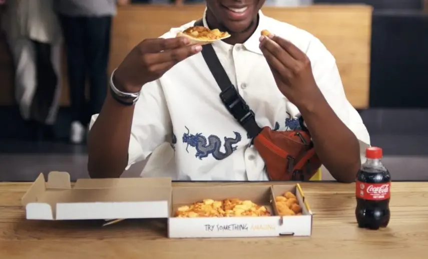 Man enjoying a meal at debonairs pizza