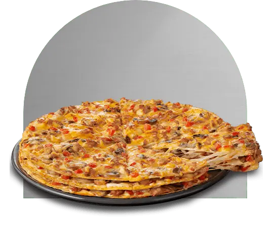 Large triple decker pizza on a black plate